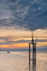 Arbon 0097-2024, Leuchtturm am Hafen im Morgenrot